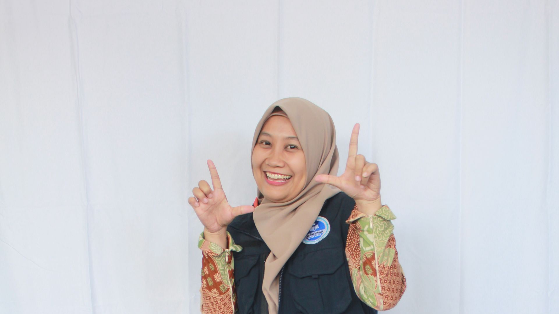 Fitriani Rachman, S.Pd.,M.Pd.,Gr.